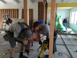 Steve started finishing the drywall while the others work on the post foundations.