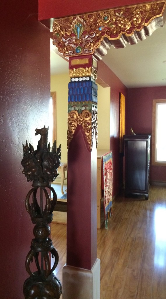 Hayagriva Phurba next to Flaming Jewel Tibetan Column.