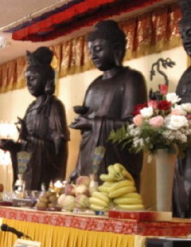 Statue of Mahāsthāmaprāpta Bodhisattva at Temple in Monterey Park, CA with Amitabha Buddha in the center and Kuan Yin Bodhisattva on the right.