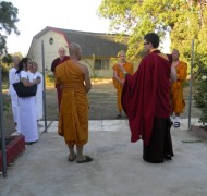Thai monks and German Rinpoche at the site of the Holy Vajra Poles.