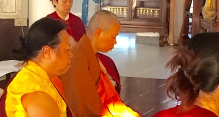 Meditating at a Thai retreat.