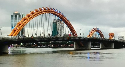 The famous Golden Dragon bridge releases either fire or water at night.