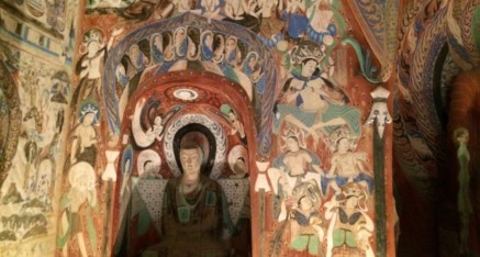 Meditation is the theme of this reproduction of Cave  #285 with the statue of the Buddha flanked by meditating monks, including the one shown here.
