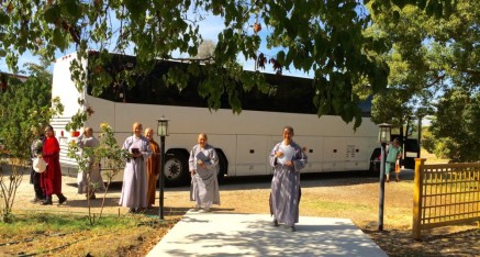 Pilgrims board a bus to Los Angeles area.