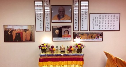 Display of photos relating to Elder Holy Monk Yin Hai at the Hua Zang Si Fresno Mission.