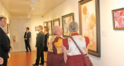 Zhaxi Zhuoma Rinpoche of Sanger, California, and Baima Gabu Rinpoche of Taos, New Mexico, are viewing very attentively H.H. Dorje Chang Buddha III’s painting 