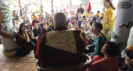 Listening to participants tell their experiences after the Kuan Yin Bodhisattva Great Compassion Empowerment in Da Nang, Vietnam.