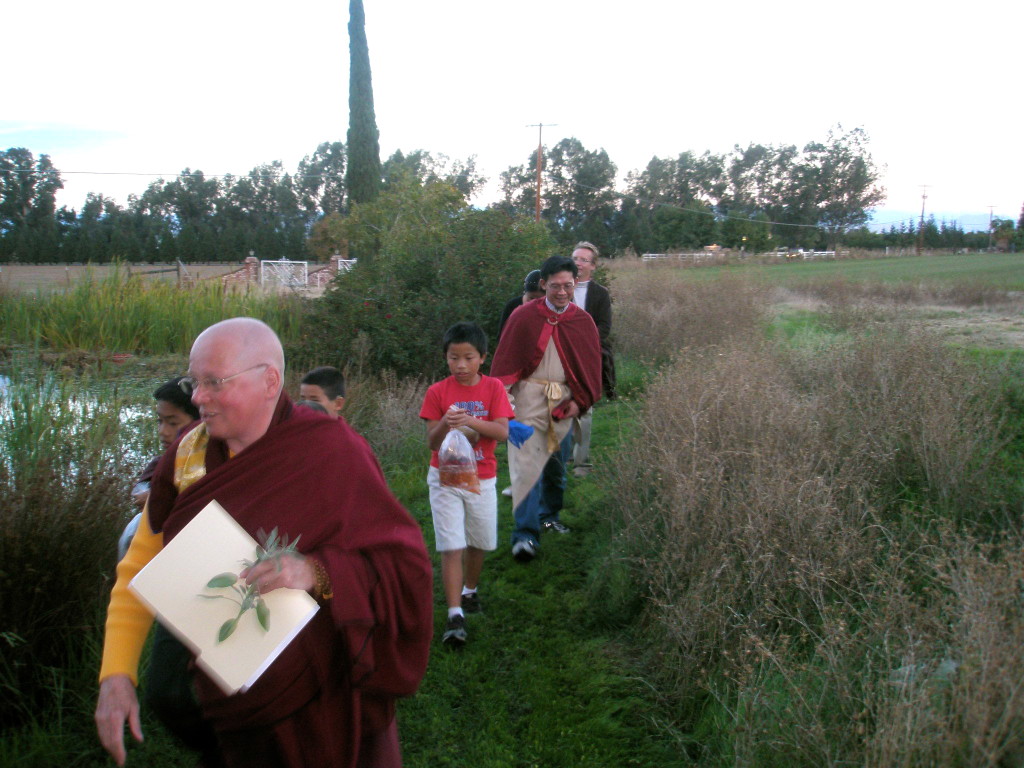 Processional to pond for fish release.