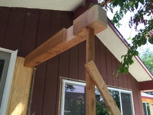 Beams are temporarily in place for entry porch.