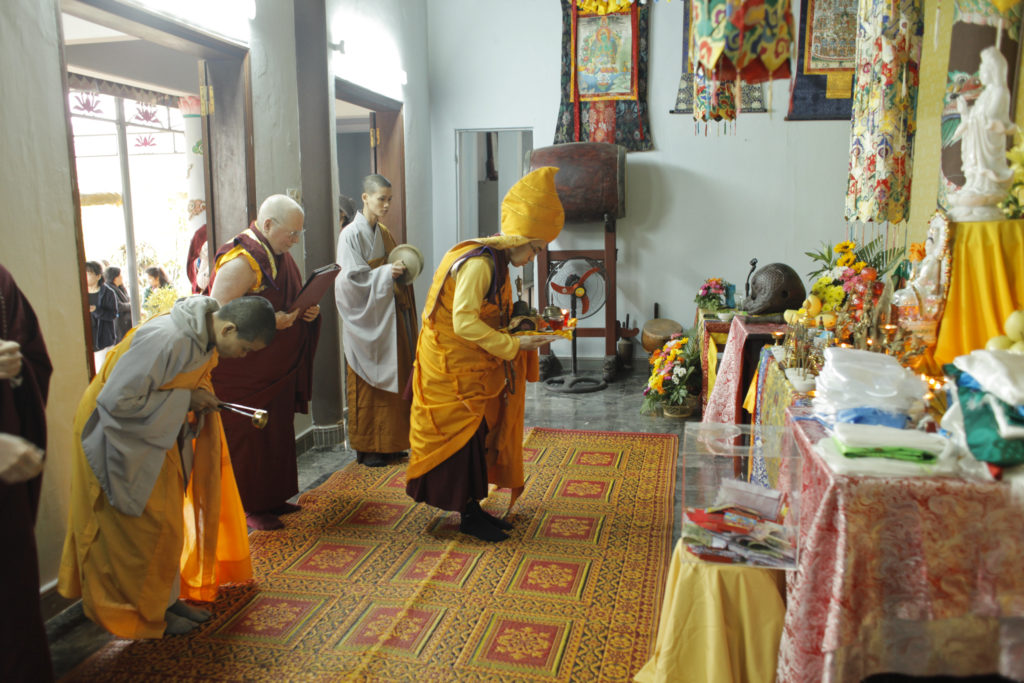 Approaching the altar for the Kuan Yin Bodhisattva Great Compassion Empowerment Dharma Assembly  held at the Thai Son Pagoda in Da Nang, Vietnam.